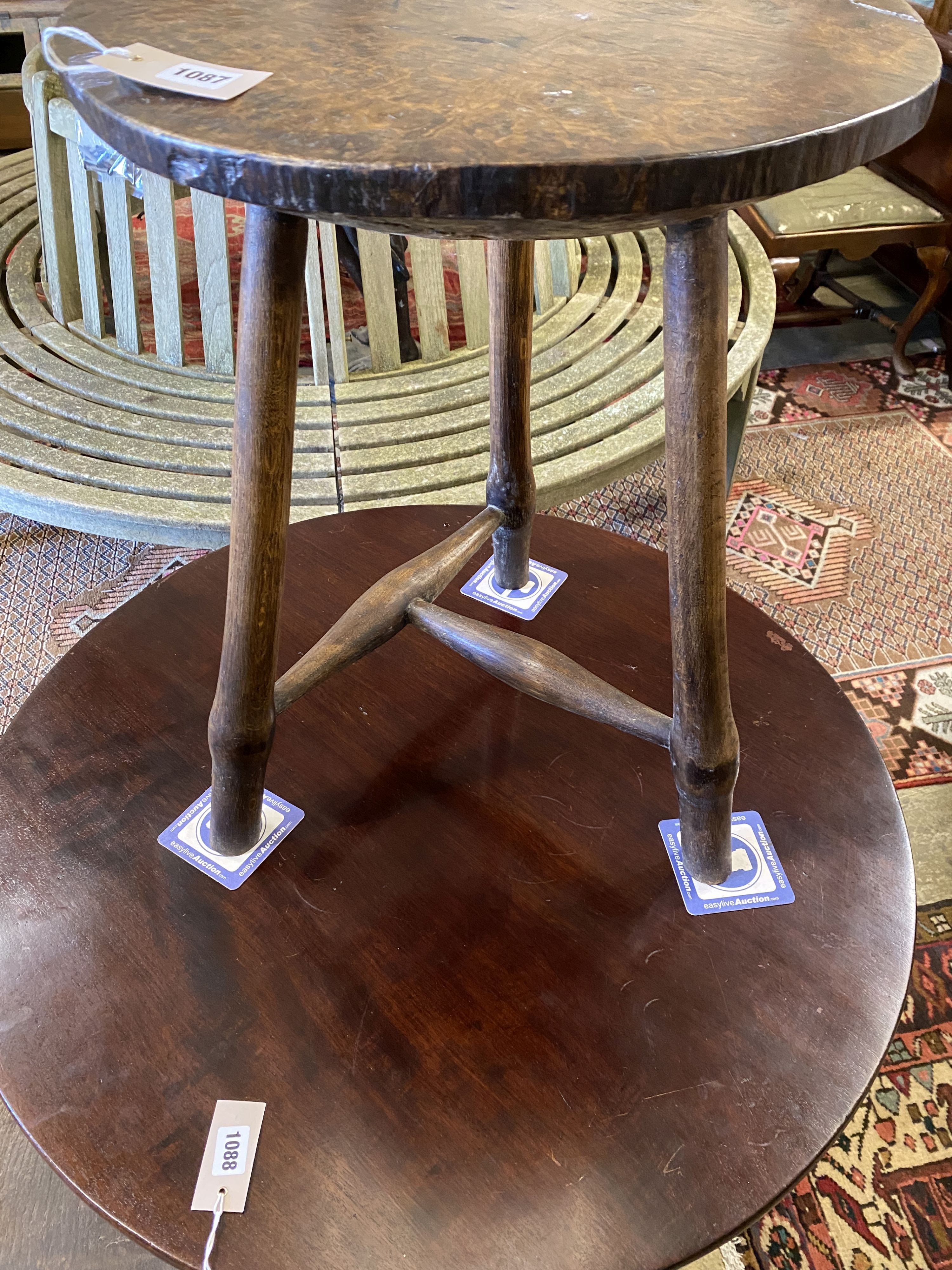 A late 18th / early 19th century circular burr elm and ash cricket table, diameter 60cm, height 62cm